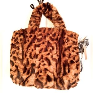 NWT. Medium plush faux fur Leopard Print double handle Bag